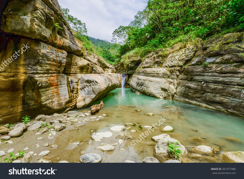 stock-photo-beautiful-stream-and-small-waterfall-at-wan-nian-canyon-in-caoling-village-yunlin-taiwan-561977488.jpg
