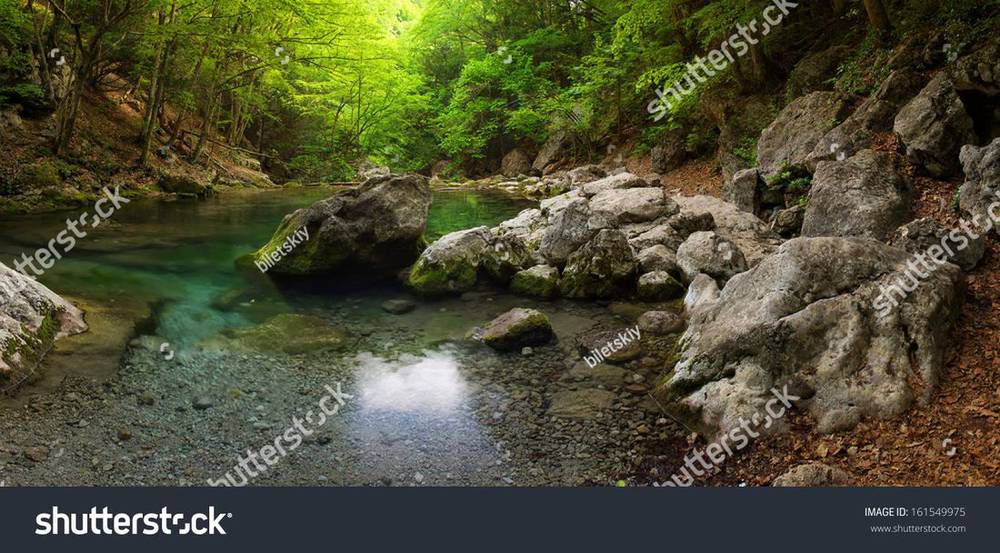 stock-photo-lake-in-the-canyon-beautiful-summer-landscape-161549975.jpg